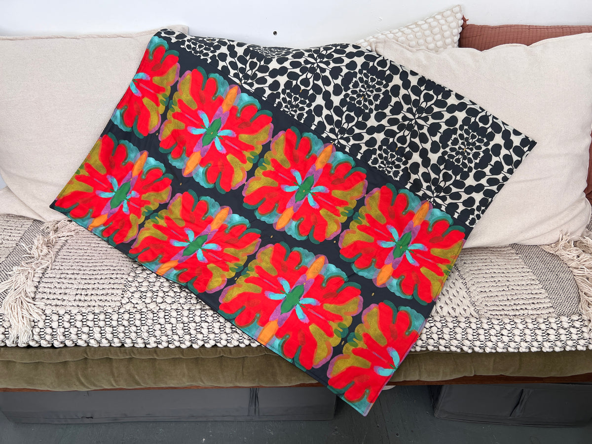 Layer Blooms, quilted blanket, on dark, small