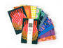 Set of colorful postcards with 10 various hand-drawn designs, spread out on a white background. Postcards are blank on the back. 