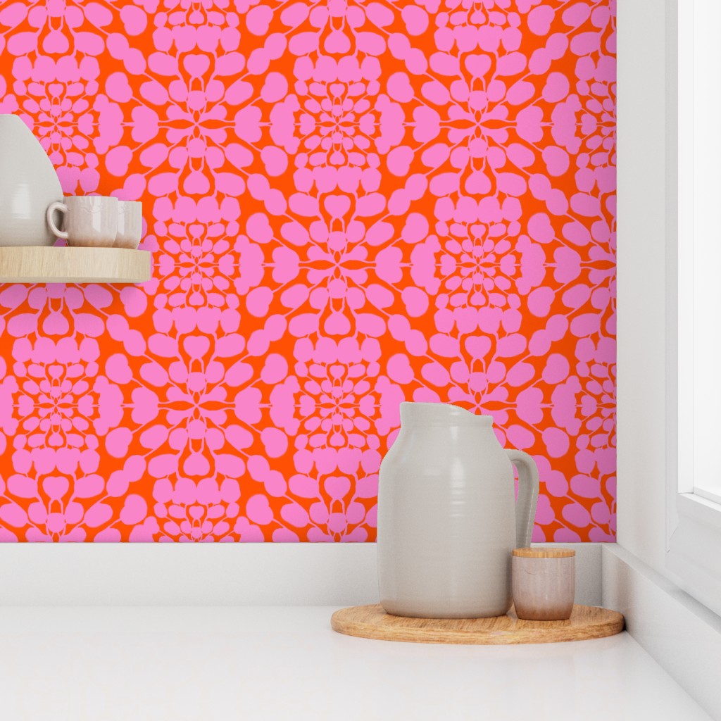 Decorative pink and orange patterned wallpaper with ceramic items on a shelf. Designed by artist Leila Simon Hayes. 