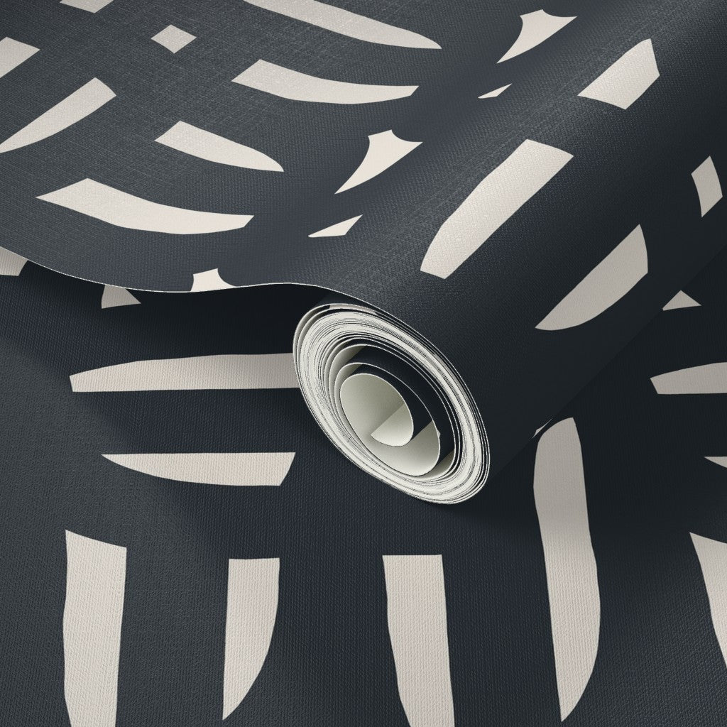 Roll of black and white wallpaper. Designed by artist Leila Simon Hayes.