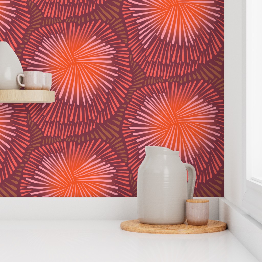 White pitcher and small container on a wooden tray against a vibrant red and orange patterned wall. Designed by artist Leila Simon Hayes.