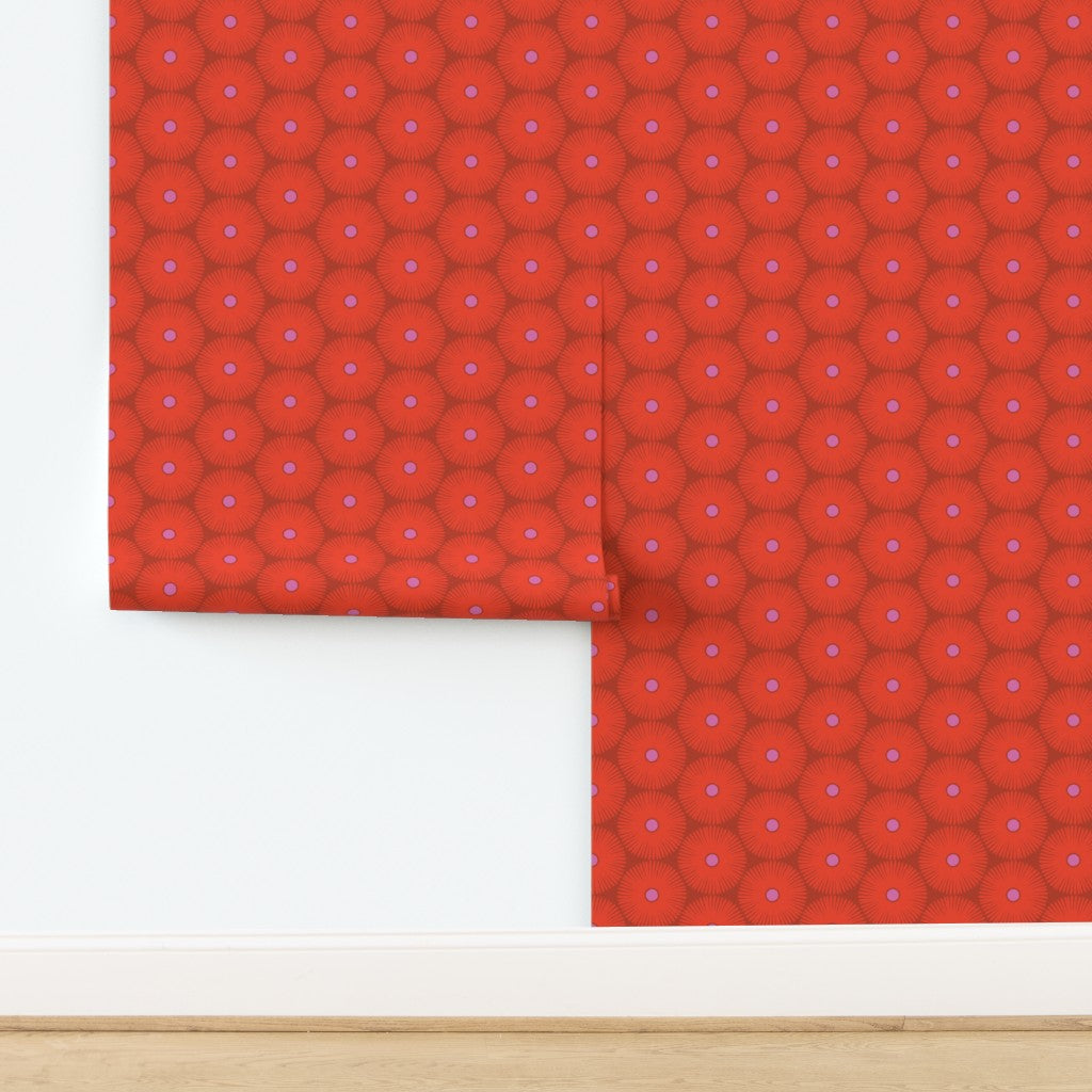 Red flower patterned paper on a white background. Designed by artist Leila Simon Hayes.