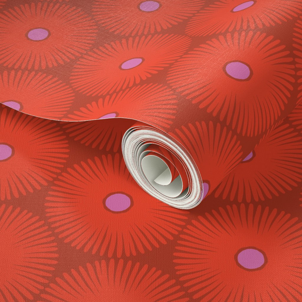 Roll of red wallpaper with a floral pattern. Designed by artist Leila Simon Hayes.