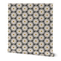 A wallpaper featuring a repeated geometric pattern with sunflower-like designs in black and white with yellow centers. Designed by artist Leila Simon Hayes.