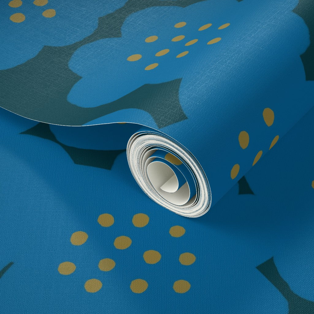 A roll of floral wallpaper in blue. Designed by artist Leila Simon Hayes.