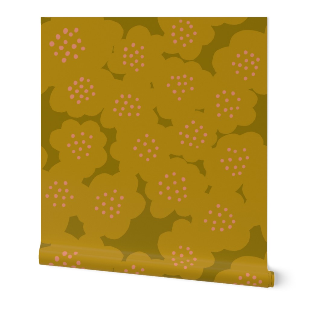 A roll of yellow wallpaper with a hand-painted abstract floral design including abstract yellow flowers with peach dotted centers, slightly overlapping. Designed by artist Leila Simon Hayes.