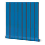 Roll of bright blue and dark blue wallpaper with vertical stripes. Designed by artist Leila Simon Hayes.
