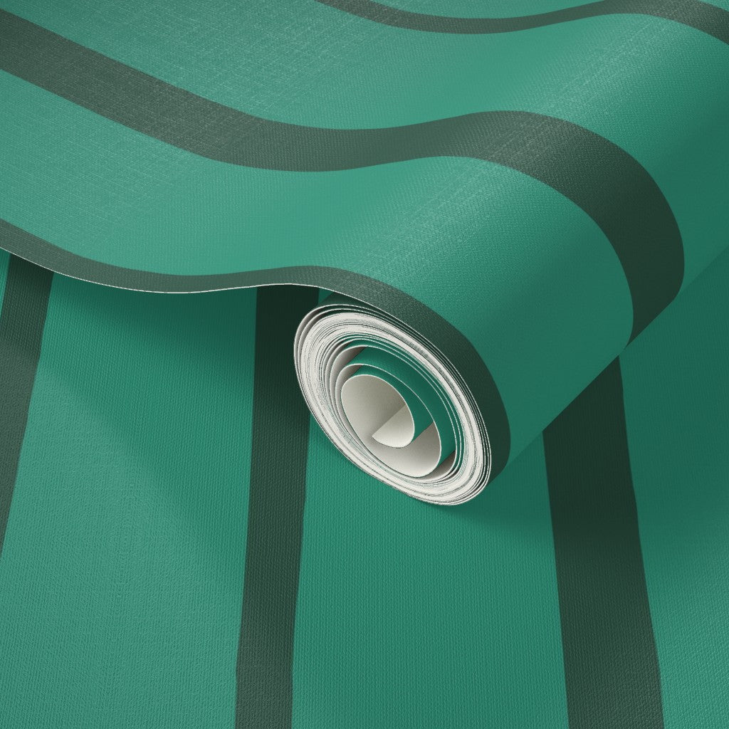 Roll of green and black striped fabric with a close-up view. Designed by artist Leila Simon Hayes.