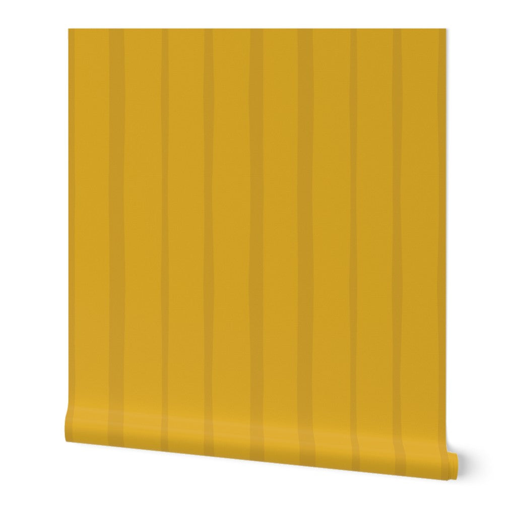 Roll of light and dark yellow, striped, wallpaper. Designed by artist Leila Simon Hayes.