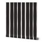 Roll of black and white striped wallpaper on a white background. Designed by artist Leila Simon Hayes.