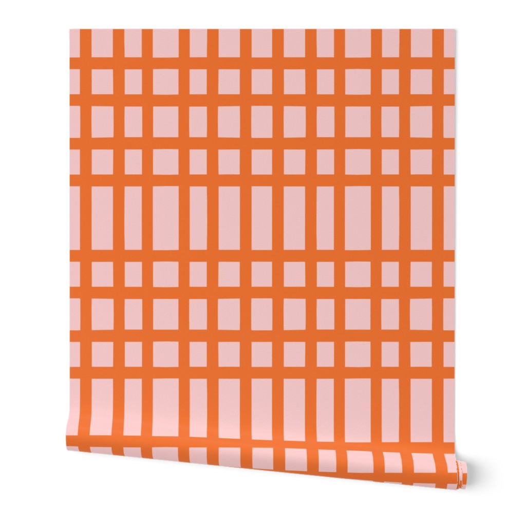 A roll of wallpaper with a checkered orange pattern over a pink base. Designed by artist Leila Simon Hayes.