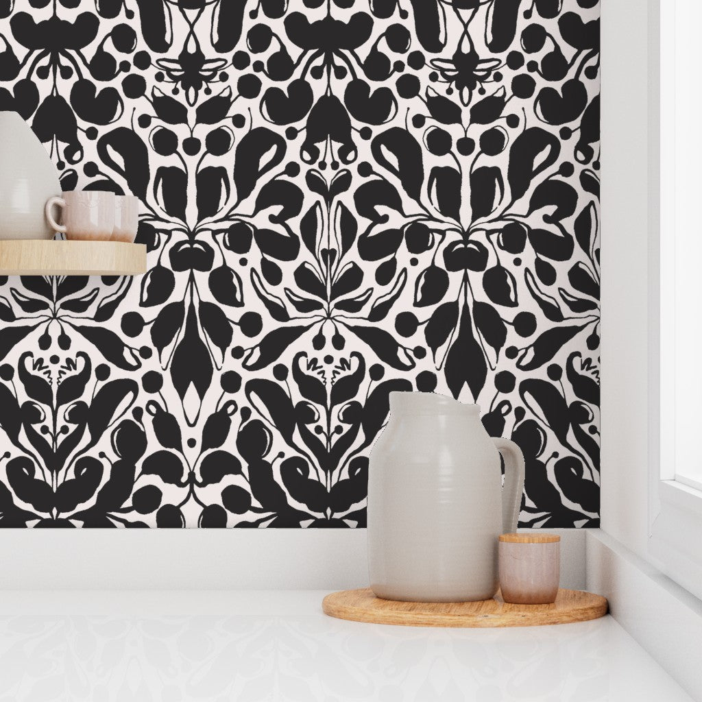 Black and white patterned wallpaper with ceramic pitcher and cups on a shelf. Designed by artist Leila Simon Hayes.