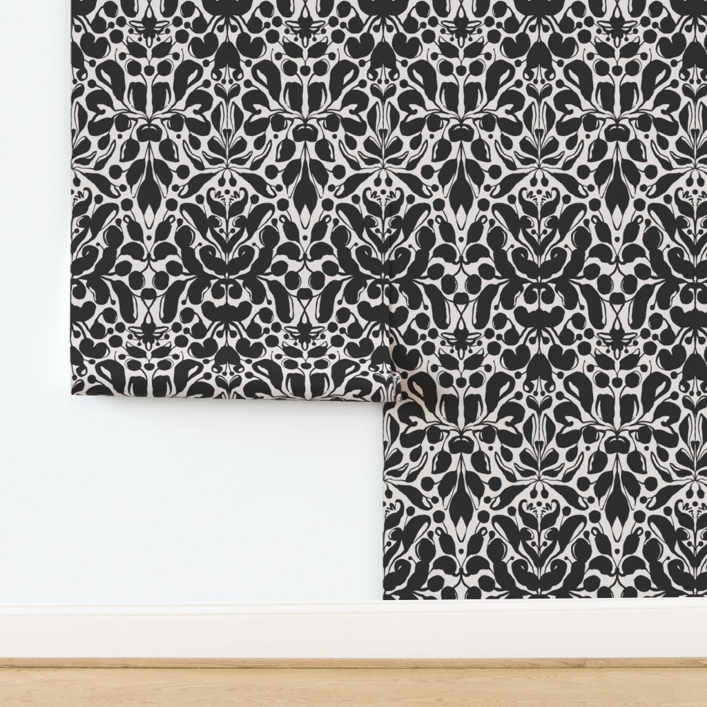 Black and white patterned wallpaper on a white background. Designed by artist Leila Simon Hayes.