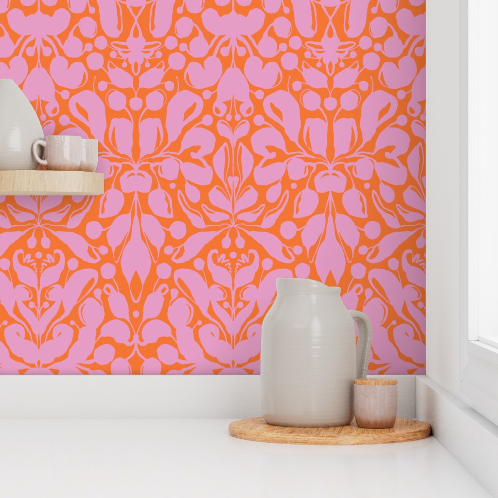 Decorative pink and orange patterned wallpaper with a white shelf and ceramic items. Designed by artist Leila Simon Hayes.