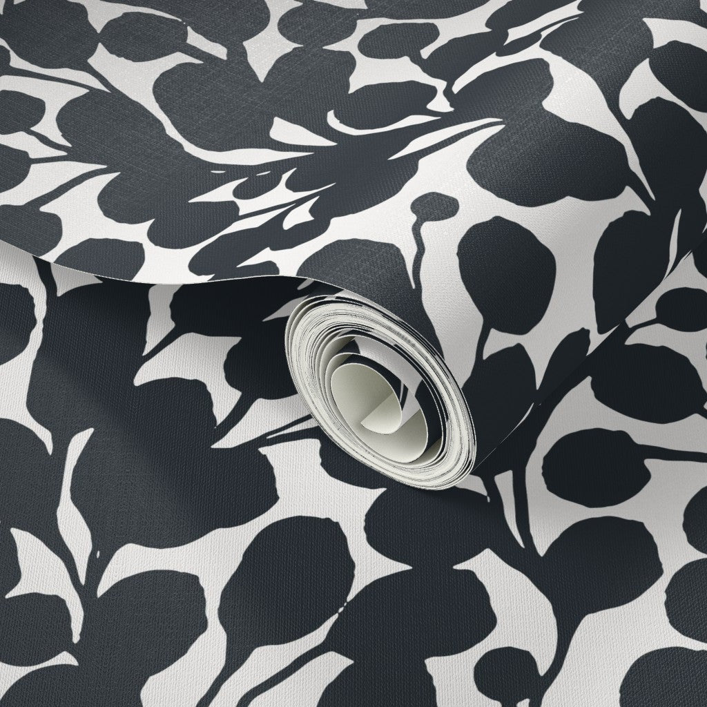Roll of black and white floral wallpaper. Designed by artist Leila Simon Hayes.