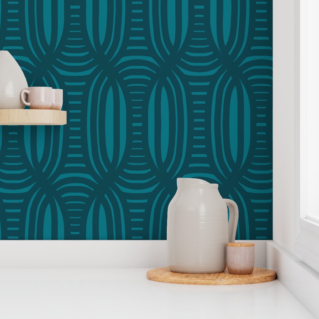 Blue patterned wallpaper with a white pitcher and small cup on a wooden surface. Designed by artist Leila Simon Hayes.