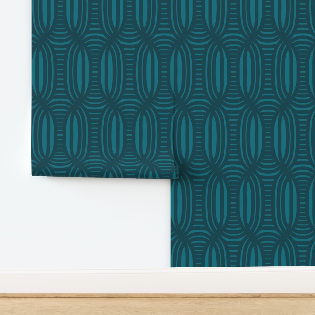 Blue patterned wallpaper roll on a white background. Designed by artist Leila Simon Hayes.