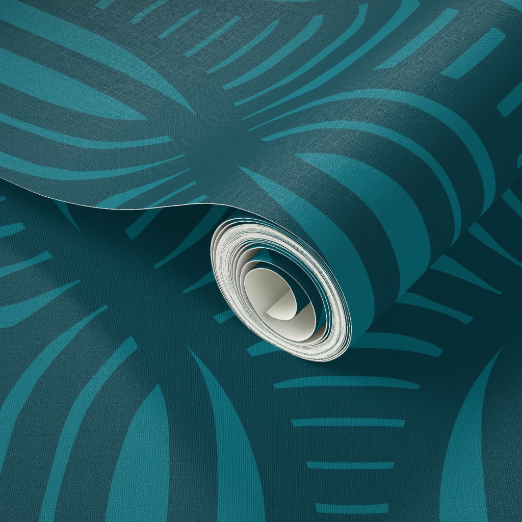 Roll of blue patterned wallpaper with a close-up view. Designed by artist Leila Simon Hayes.