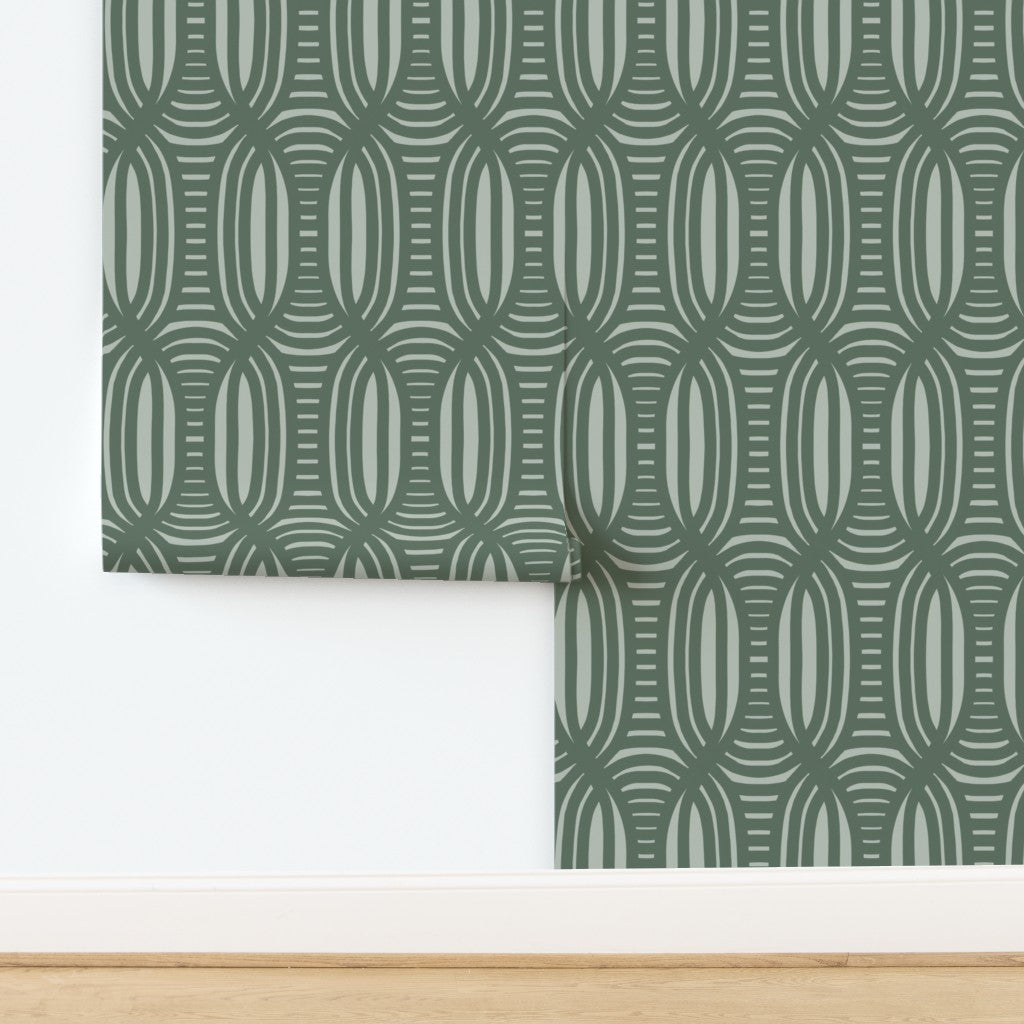 Green geometric patterned wallpaper on a white background. Designed by artist Leila Simon Hayes.