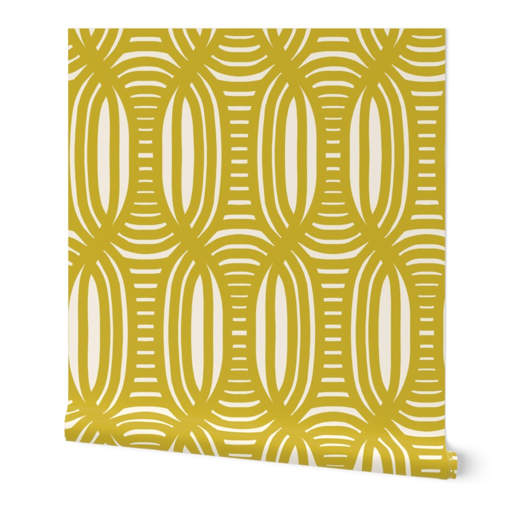 Roll of peel-and-stick geometrical wallpaper on a white background. The wallpaper has a yellow, wavy and intersecting, weave pattern over a light light yellow base. Designed by artist Leila Simon Hayes.