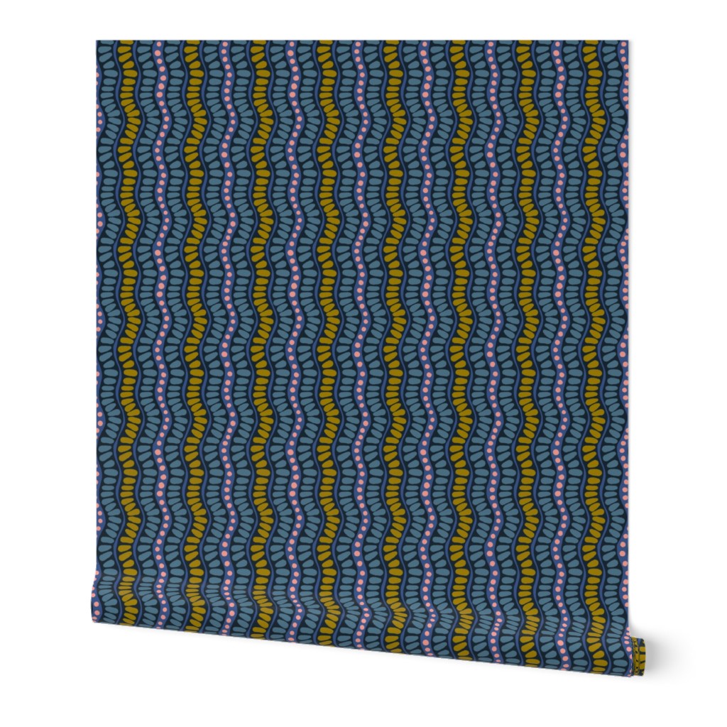 Roll of wallpaper with a wavy blue, pink, and green, pattern on a white background.  Designed by artist Leila Simon Hayes. 