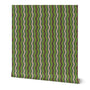 Roll of wallpaper with a green and red wavy pattern on a white background. Designed by artist Leila Simon Hayes. 