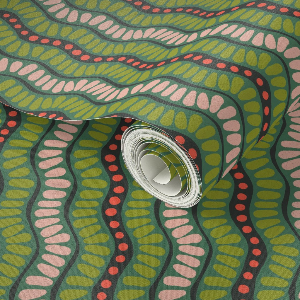 Roll of wallpaper with a colorful wavy pattern. Designed by artist Leila Simon Hayes. 
