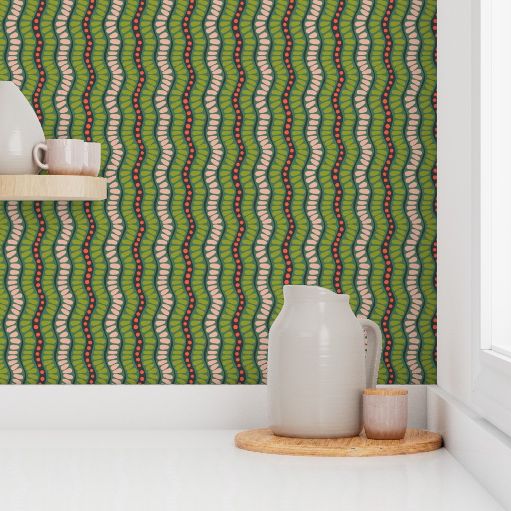 Kitchen scene with a green patterned wall, white pitcher, and small container. Designed by artist Leila Simon Hayes. 