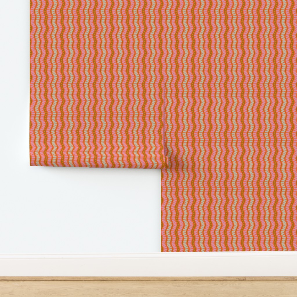 Roll of wallpaper with a red and white wavy pattern on a white background. Designed by artist Leila Simon Hayes. 