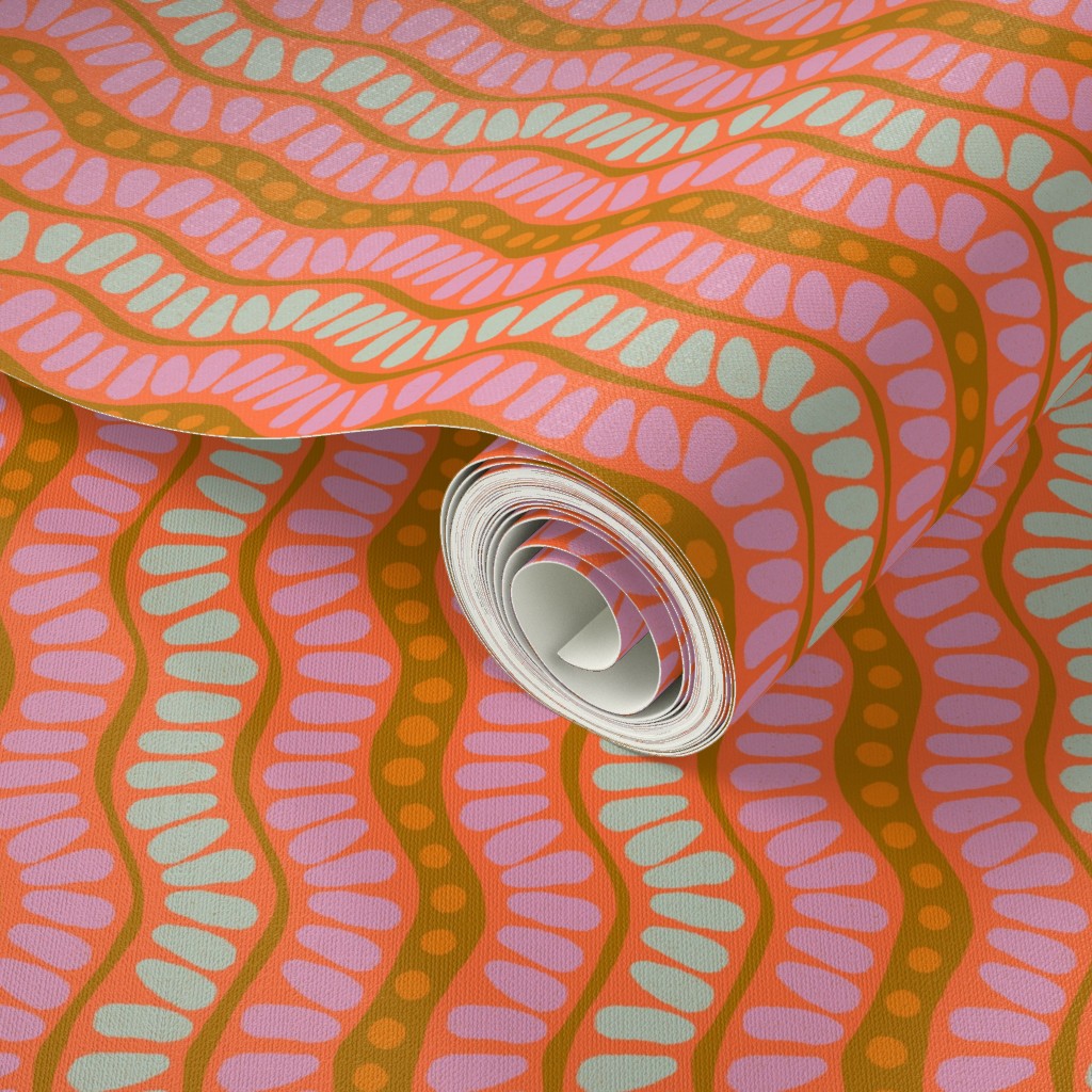 Roll of wallpaper with a colorful wavy pattern. Designed by artist Leila Simon Hayes. 