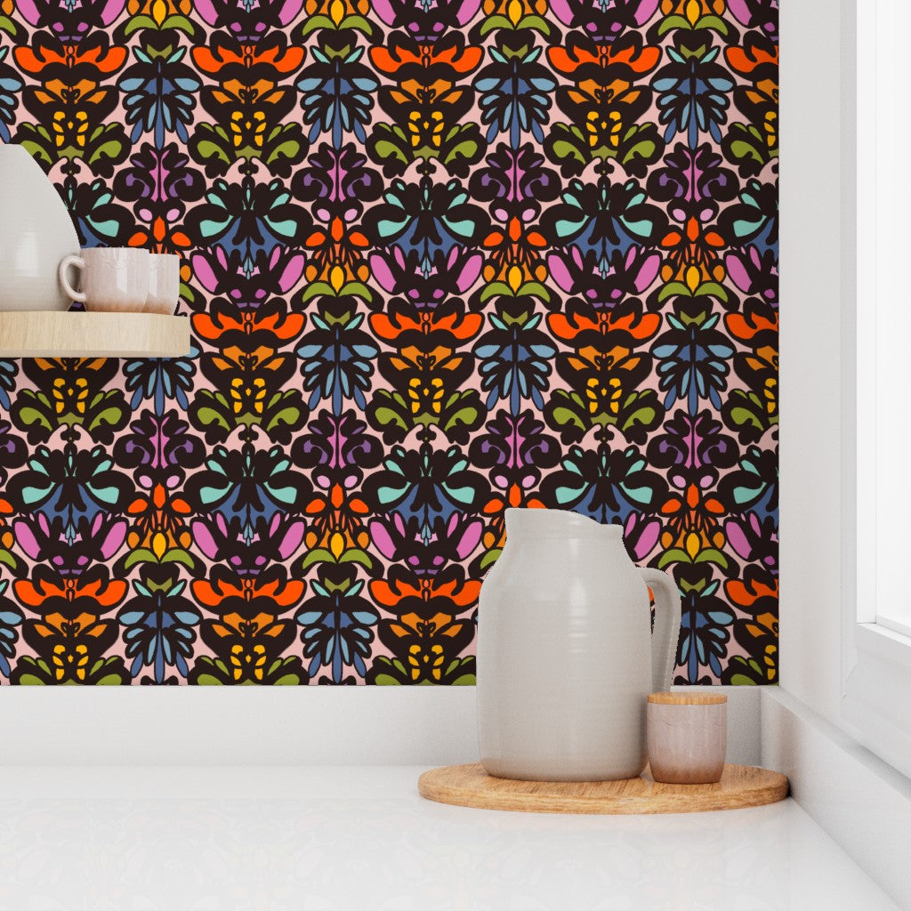 Colorful patterned wallpaper with a white vase and wooden tray on a shelf. Designed by artist Leila Simon Hayes. 