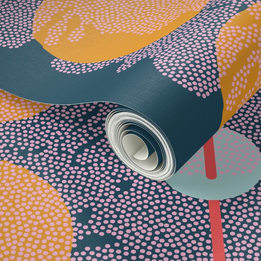 Roll of wallpaper with colorful geometric pattern. Designed by artist Leila Simon Hayes.