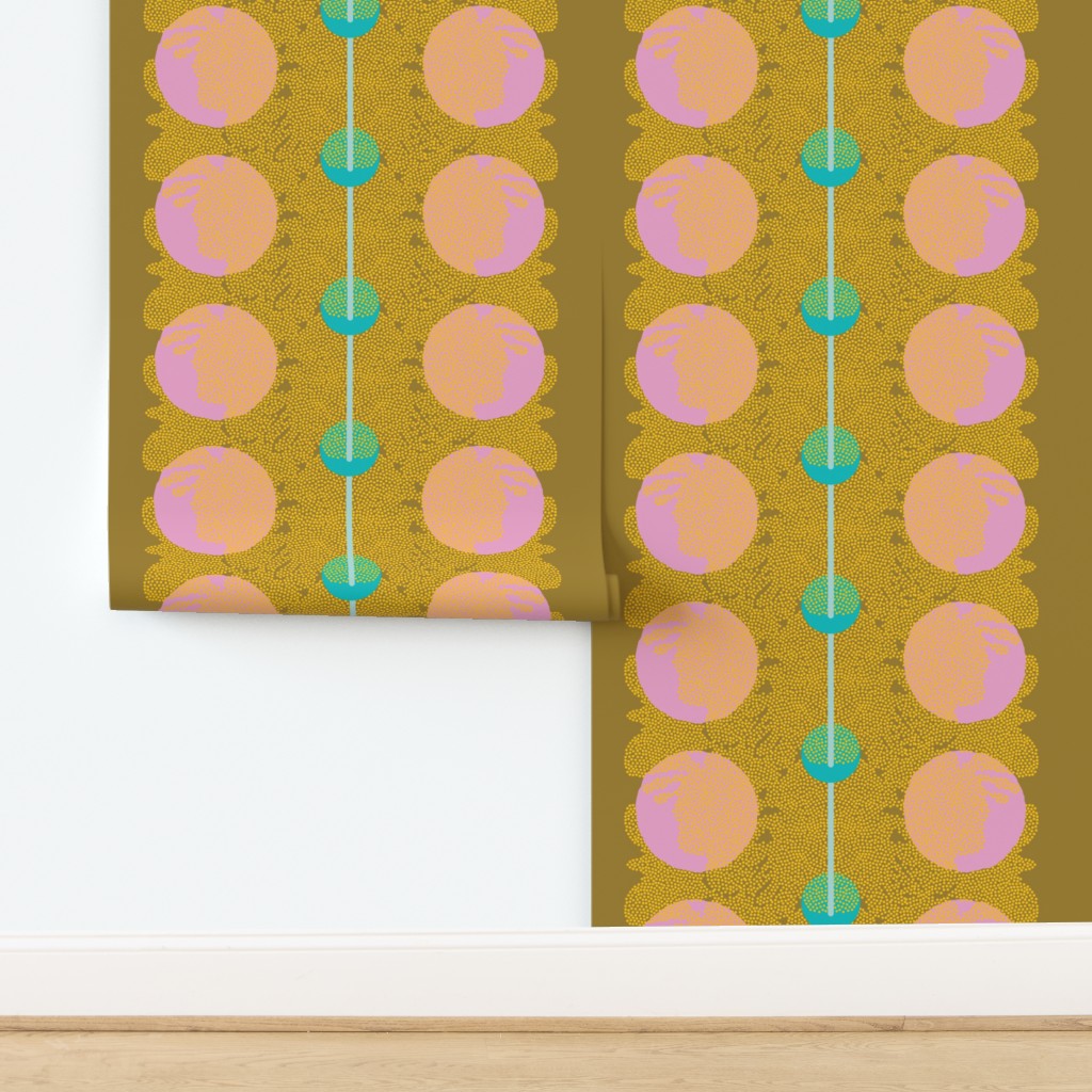 Patterned paper with pink and green circles on a yellow background. Designed by artist Leila Simon Hayes.