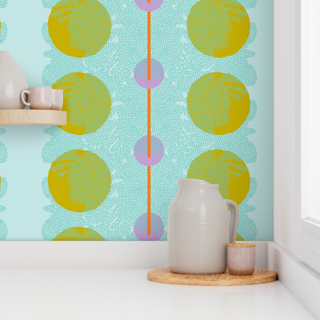 Kitchen scene with a pitcher and cups on a shelf against a wall with circular patterned wallpaper. Designed by artist Leila Simon Hayes.