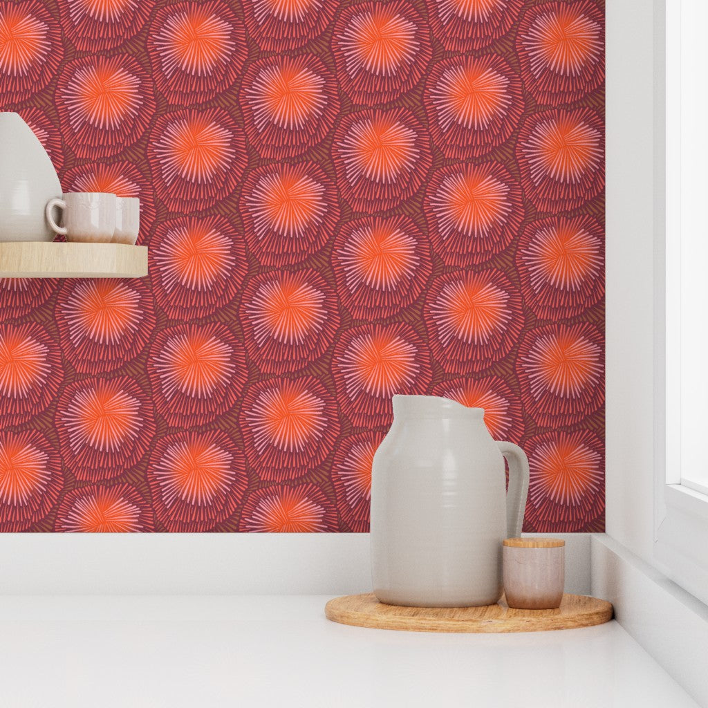 White pitcher and small cup on a wooden tray against a red and pink patterned wall. Designed by artist Leila Simon Hayes.