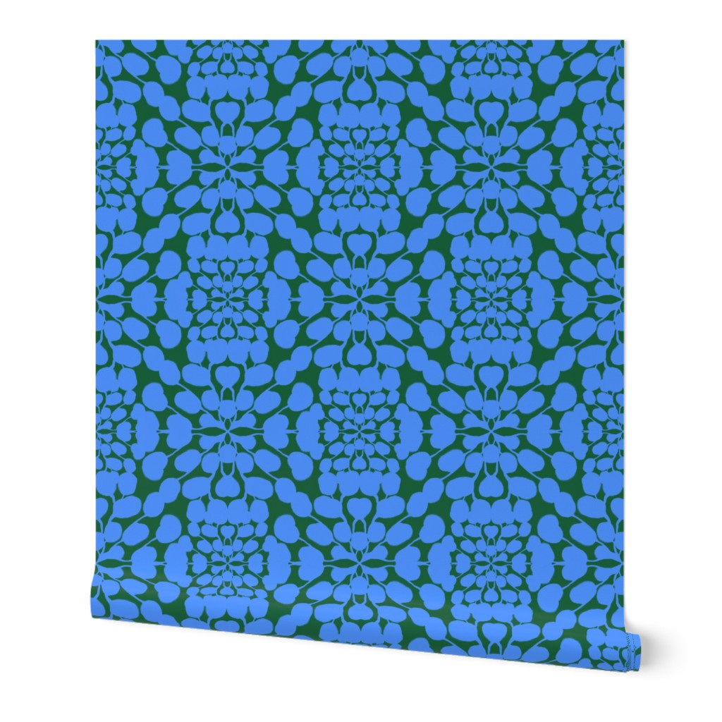Blue and green patterned fabric on a white background. Designed by artist Leila Simon Hayes.