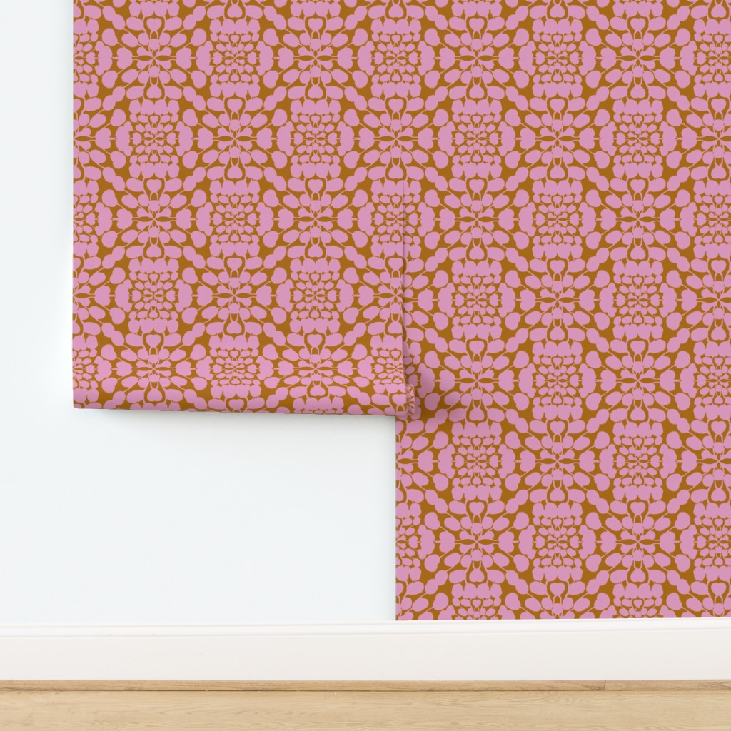 Pink patterned wallpaper roll on a white background. Designed by artist Leila Simon Hayes.