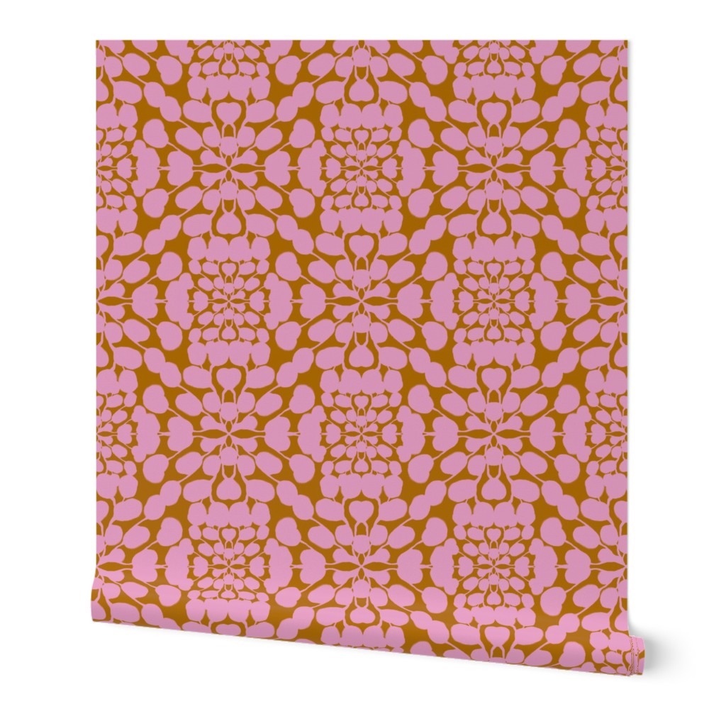 Pink and orange patterned roll of wallpaper on a white background. Designed by artist Leila Simon Hayes.