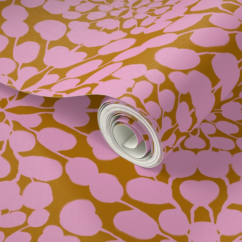 Roll of wallpaper with pink floral pattern on brown background. Designed by artist Leila Simon Hayes.