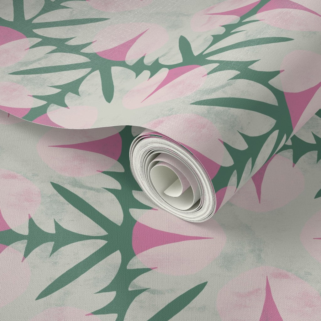 Roll of wallpaper with pink and green floral pattern. Designed by artist Leila Simon Hayes. 