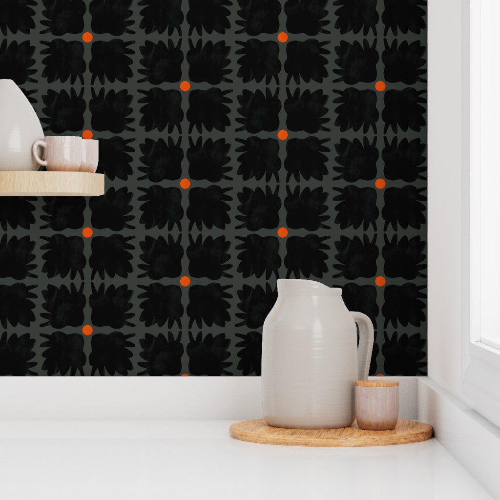 White pitcher and cup on a wooden tray against a dark wall with tree and light pattern. Designed by artist Leila Simon Hayes.