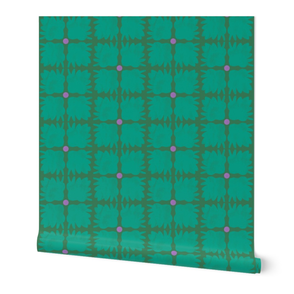A green roll of wallpaper with a grid pattern on a white background. Designed by artist Leila Simon Hayes.
