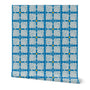 Blue and white patterned wallpaper with yellow circle accents on a white background. Designed by artist Leila Simon Hayes.