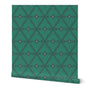 Green roll of wallpaper with a geometric pattern on a white background. Designed by artist Leila Simon Hayes. 