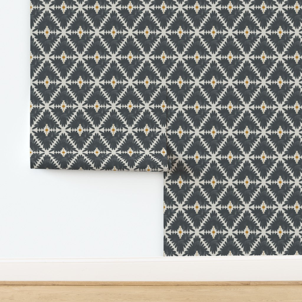 Roll of black and white wallpaper with a geometric pattern on a white background. Designed by artist Leila Simon Hayes. 