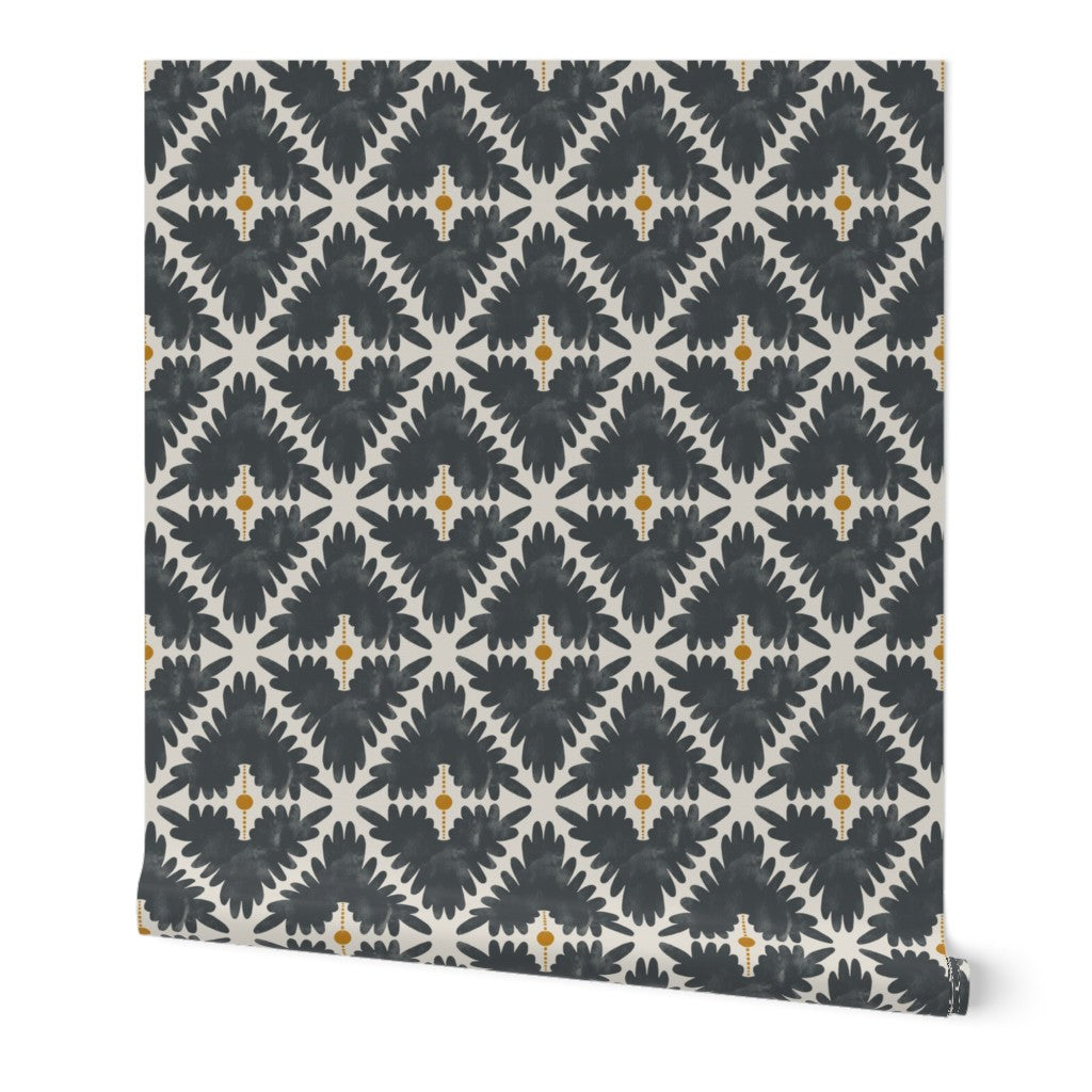 Patterned black and white roll of wallpaper  with geometric design on a white background. Designed by artist Leila Simon Hayes. 