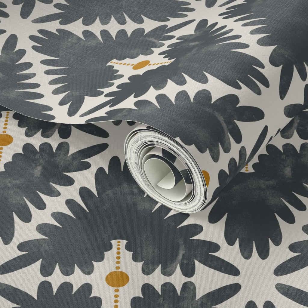 Roll of wallpaper with black floral pattern on a white background. Designed by artist Leila Simon Hayes. 