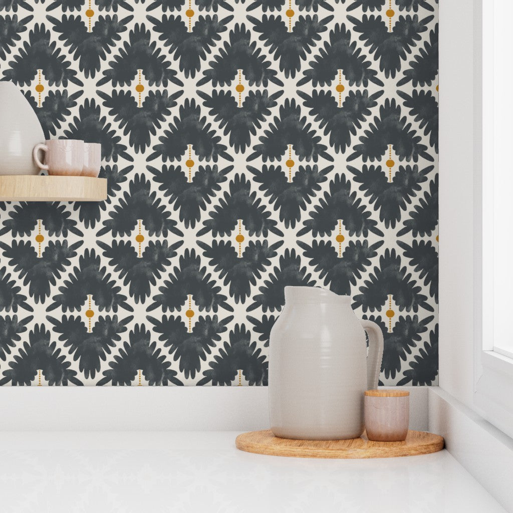 Patterned wallpaper with geometric design behind a kitchen countertop. Designed by artist Leila Simon Hayes. 