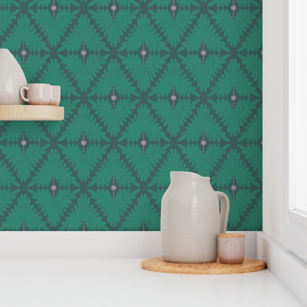 Kitchen counter against a green patterned wallpaper backsplash. Designed by artist Leila Simon Hayes. 