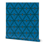 Roll of blue paper with geometric pattern on a white background. Designed by artist Leila Simon Hayes. 